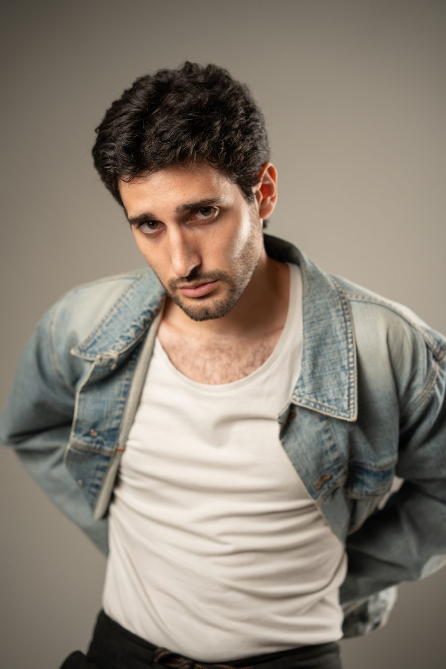 Jovan Penezić, denim jacket over white t-shirt.