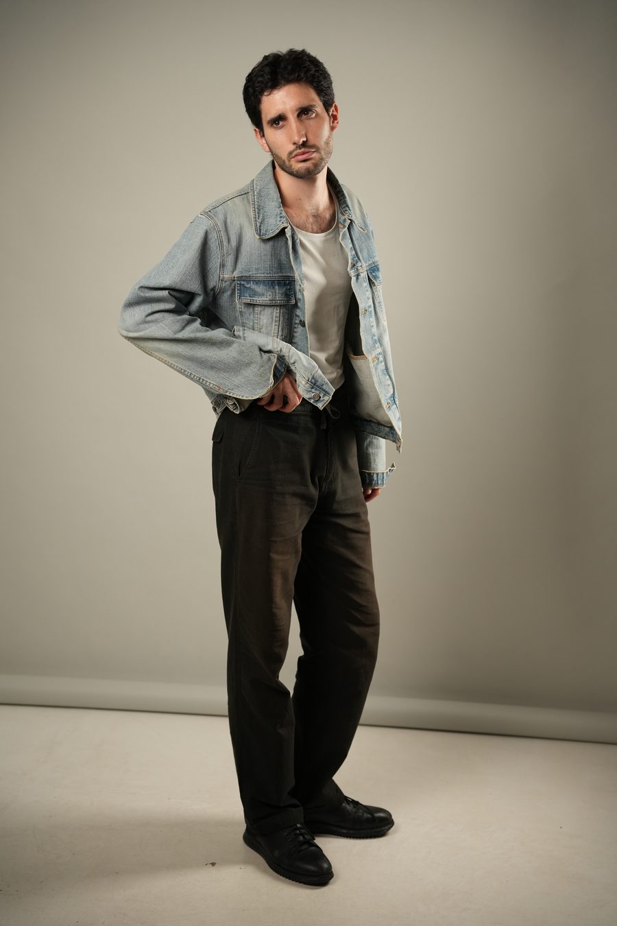 Jovan Penezić, full-length studio portrait.